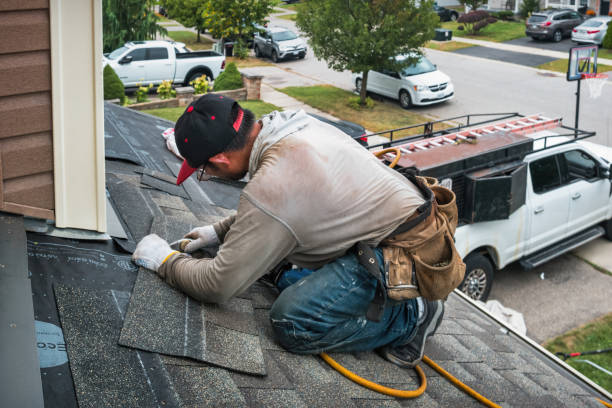 Professional Roofing technician working in Chester, IL